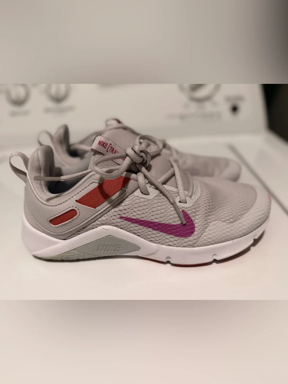 Nike Kids Light Gray Sneakers with Pink Swoosh and Coral Accents
